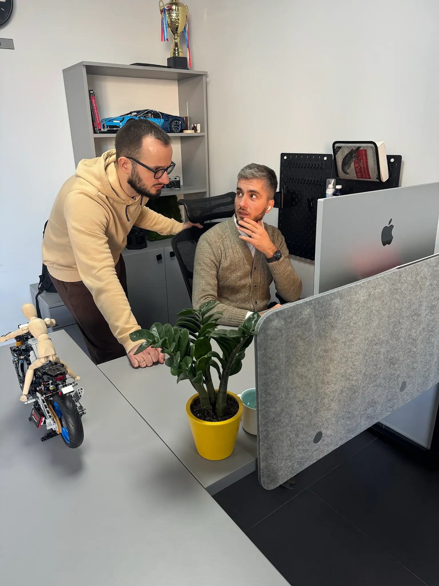 Dmitry Cherchel and Pavel during a technical discussion in the Webdelo office.