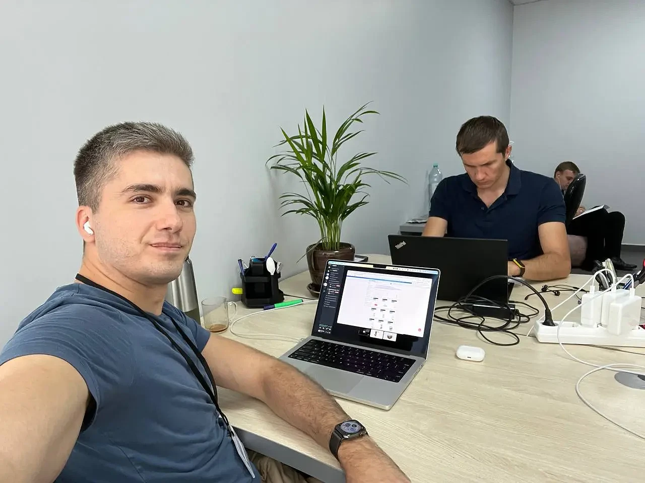 Dmitry Cherchel with a Webdelo employee during a working session in the office